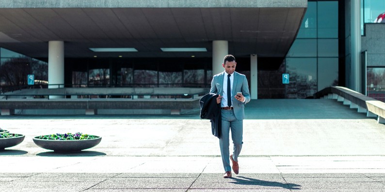 Businessman leaving office building