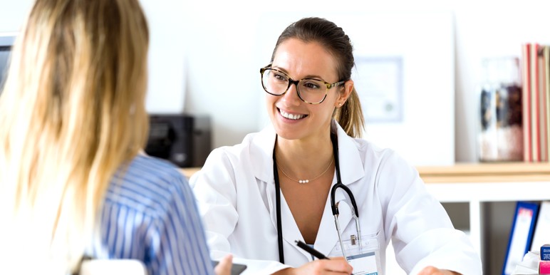 Doctor talking to a patient in an office