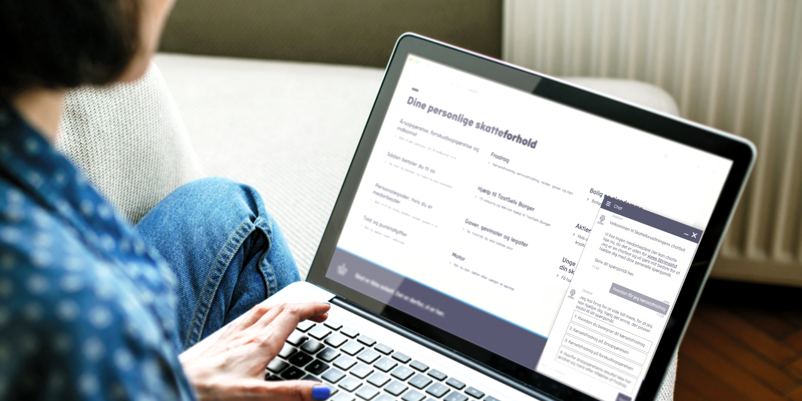 Woman visiting skat.dk on a laptop